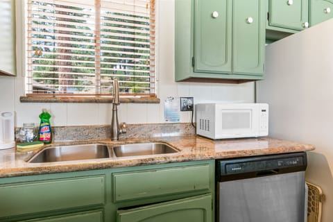 Kitchen - Full kitchen with stove/oven, refrigerator, dishwasher, microwave, blender, toaster, coffee maker, dishes, pots/pans, & more.