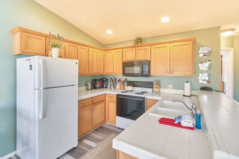 Kitchen - Fully stocked for your cooking needs.