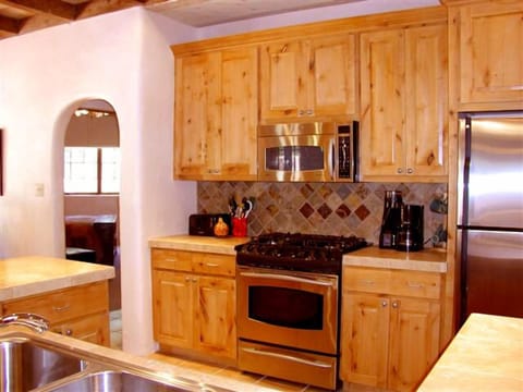 Upgrade appliances, Knotty Alder cabinets