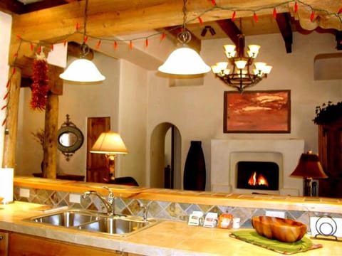 Kitchen view to living room & fireplace