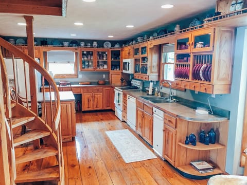 Hand made Bybee Pottery is on display in the entire kitchen. 