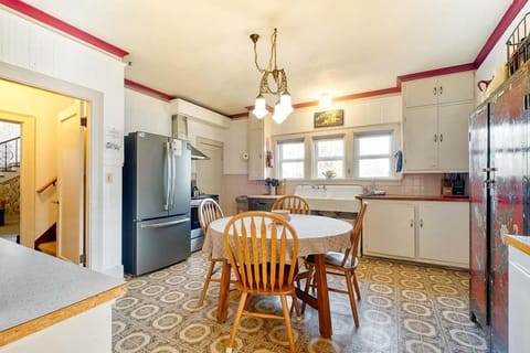 Enjoy the modern convenience with new appliances while savoring the historic charm of the original kitchen sink