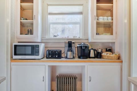 Indulge in our vacation rental's full coffee bar, complete with everything your coffee-loving heart desires; your first cup of coffee is on us with Keurig coffee pods!