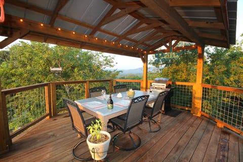 Covered outdoor dining + grill