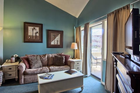 Living Room - This cozy living room is perfect to relax in seated in a nice sized recliner or the love seat. You can enjoy a movie on the TV or just cozy up to the electric fireplace.