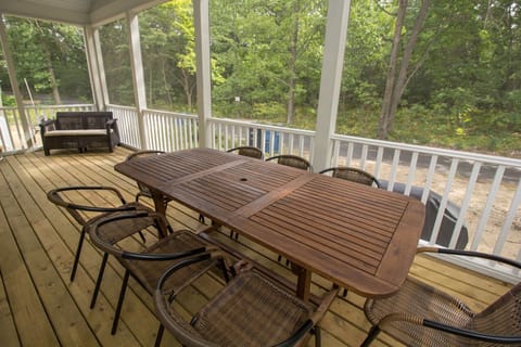 Outdoor Living | Screened Porch - Back screened in porch has new outdoor furniture for all to enjoy.