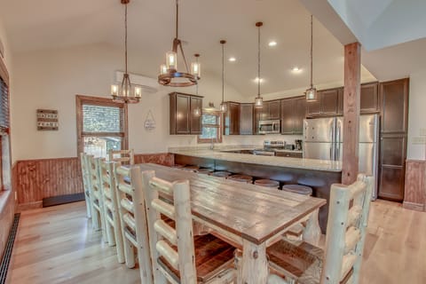 Kitchen with Table, Chairs, and Refrigerator at our Poconos Luxury Rental
