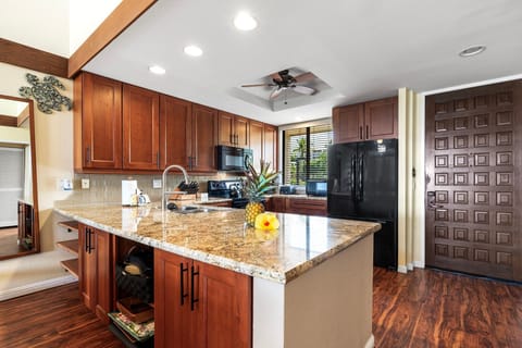 Fully Equipped Kitchen with Marble Countertops