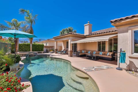 Gorgeous backyard with pool, spa, fire table, BBQ, lounging, and mountain views!