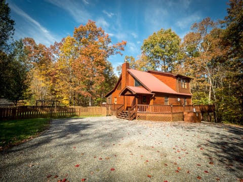 watch over the kids playing in the fenced yard