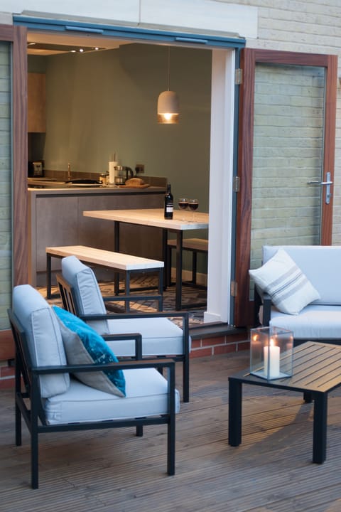 Kitchen diner with outside patio and garden furniture.