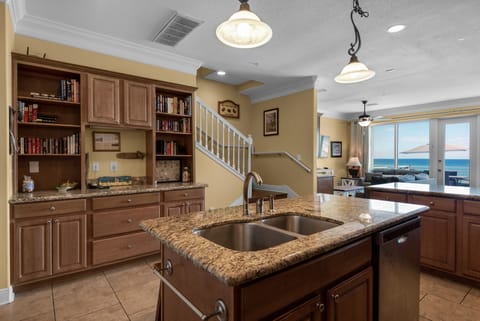 Island in kitchen provides additional space