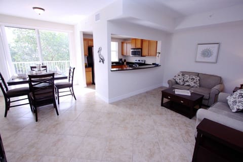Spacious Living Area w/Flat Screen TV, Tile Floor and Canal View