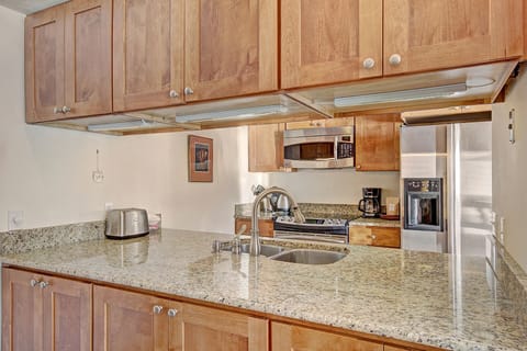 Nicely updated kitchen with stainless steel appliances.