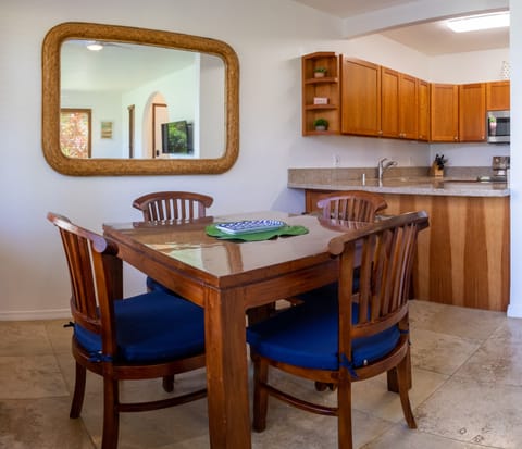 Kahala 312 Dining Area toward Kitchen - Kahala 312 dining table looks toward the kitchen and opens to the living area.
