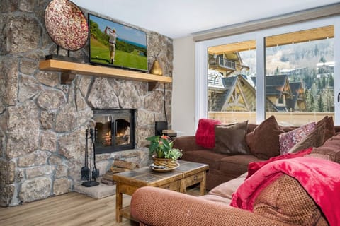 Cozy up by the wood-burning fireplace after a day on the slopes!