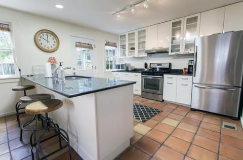 Fully equipped kitchen with modern conveniences.