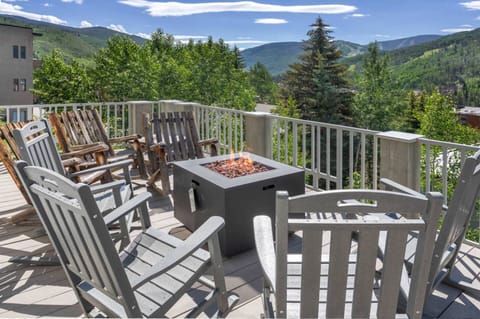 Gather around a cozy gas fire pit and take in the breathtaking views of Vail Mountain from this stunning deck!
