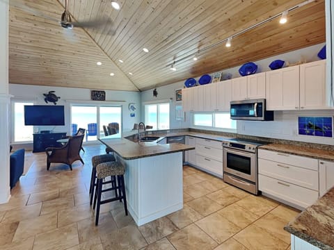 Kitchen with Breakfast Bar + Views