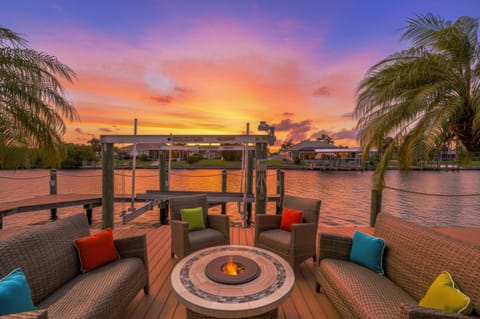 Sunset views from the cozy waterfront patio retreat