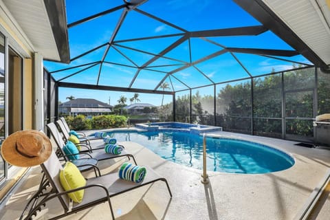 View of the large and very private pool deck with hot tub