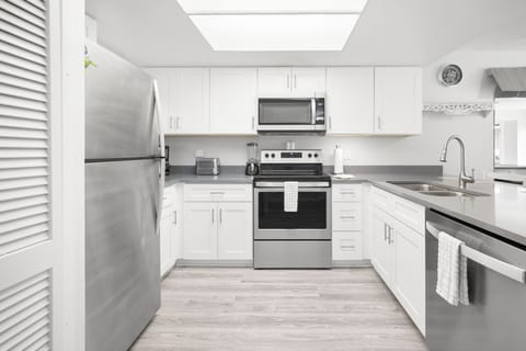 Fully Equipped Kitchen with Stainless Steel Appliances