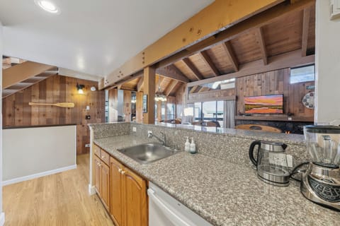 Numerous small appliances including coffee machine, electric kettle, and blender