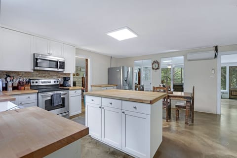 The entrance of the main home opens up to a spacious kitchen