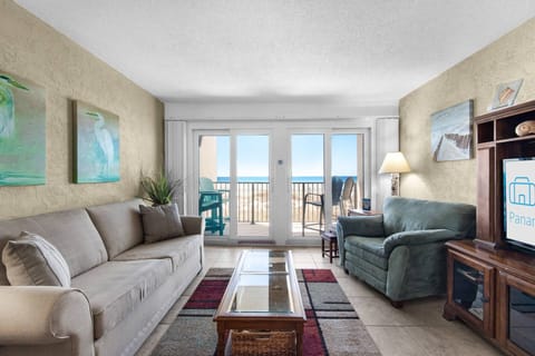 Step into the inviting living area, where you'll find a big screen tv and plush sleeper sofa perfect for relaxing or accommodating additional guests!