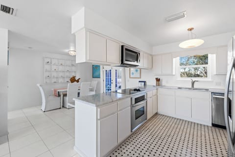 Kitchen Bar + Dining Area