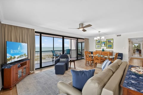 Living area with floor-to-ceiling Gulf views