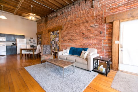 COUCH IS OPEN TO QUEEN BED