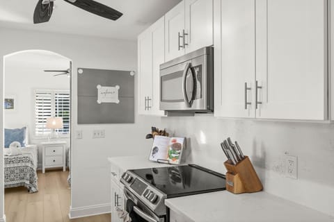 Cook with ease in the updated kitchen featuring modern appliances and generous counter space.