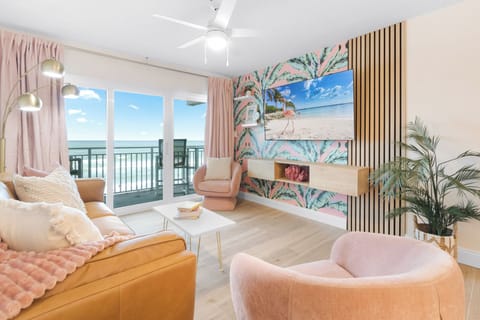 Relax in this airy ocean view living space where the waves are just a glance away