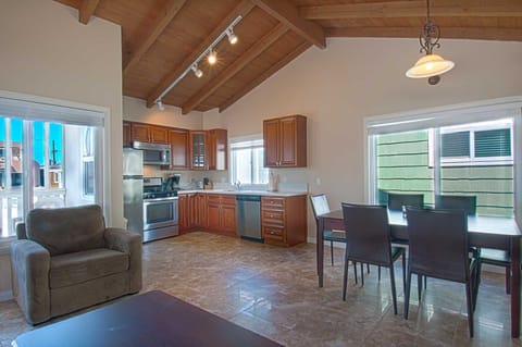 Inside photo showing kitchen & dining area