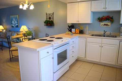 Just across the low bar is the dining area - so convenient.