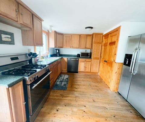 Full Kitchen. - Fully equipped, cooking basics, dishware & flatware, microwave, toaster, drip coffee maker, dishwasher, trash bags, paper towels.