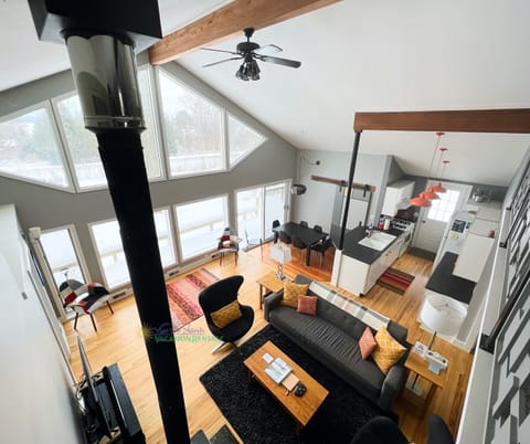 View of kitchen and living area. - View of kitchen and living area.