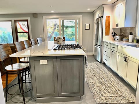 Updated Kitchen with island. Access to front porch - Updated Kitchen with island. Access to front porch.