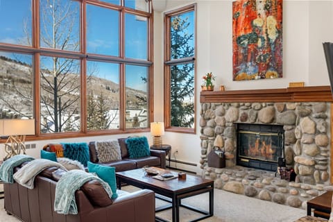 Living Room features a wood burning fireplace