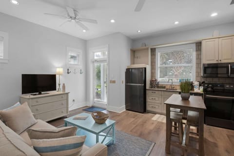 Fully stocked first level kitchen with plastic wares to dine and hangout poolside!