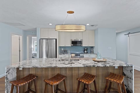Fully Stocked Kitchen; Island with High Chairs!