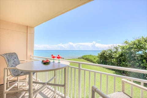 Private balcony with high-top seating, perfect for sipping coffee or wine while soaking in the view.
