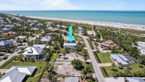 Aerial view showing Tiki Too's distance to the beach