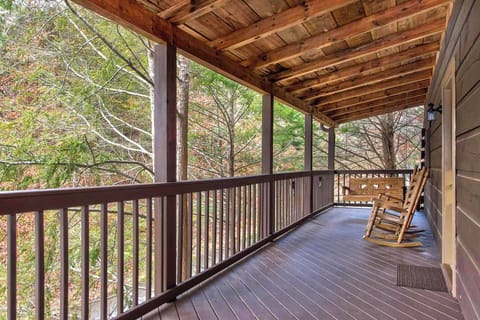 Enjoy the wooded views this property offers while your relax on the front porch.