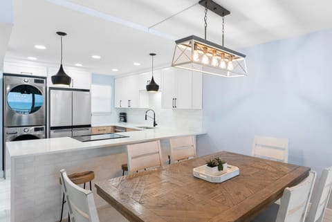 Gather around the stylish dining table that seats six