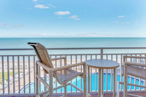 Sip your morning coffee on a private balcony while taking in the endless ocean horizon.