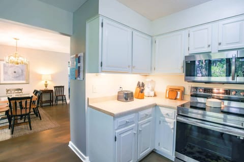 The kitchen opens onto the dining area.