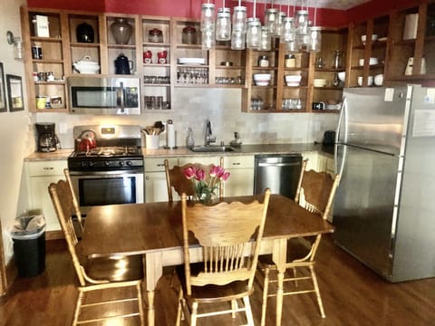 Kitchen and dining area. - Fully equipped, cooking basics, dishware & flatware, dishwasher, microwave, toaster, drip coffee maker, trash bags, paper towels.