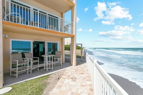 Step onto your private patio located directly on the beach